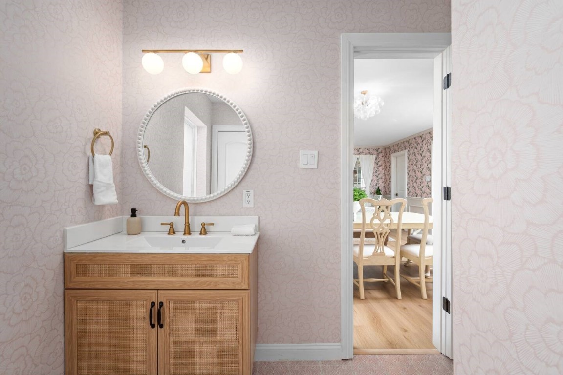 3236 Binz Street Houston, TX 77004 - Photo 38 of 50 a bathroom with a sink and a mirror