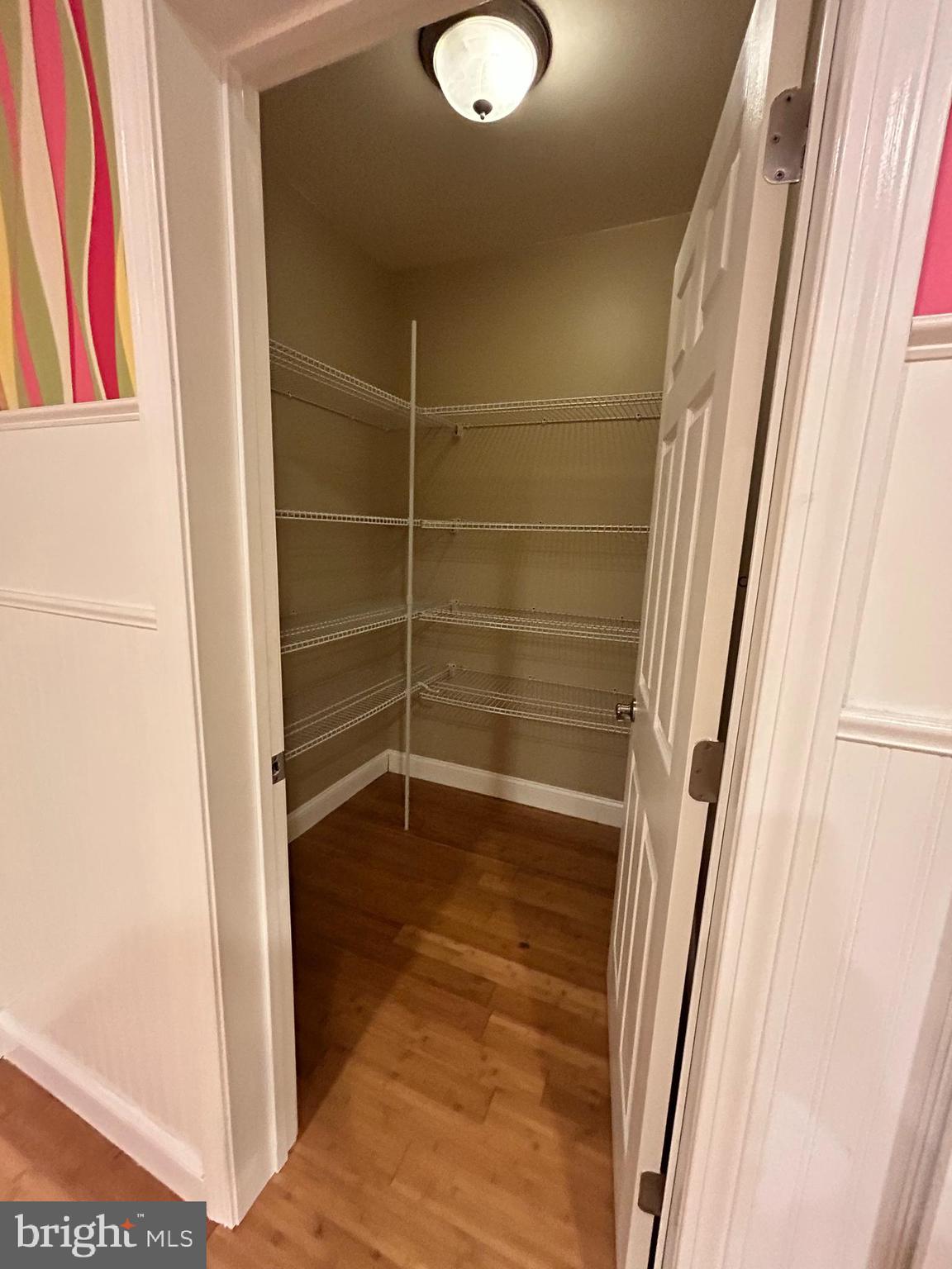 690 Good Shepherd Way Owings, MD 20736 - Photo 21 of 27 a view of wooden closet with wooden floor