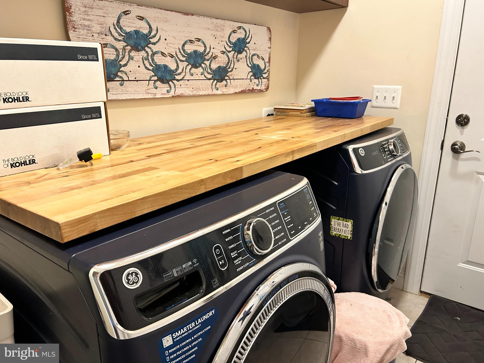 690 Good Shepherd Way Owings, MD 20736 - Photo 23 of 27 a utility room with dryer and washer