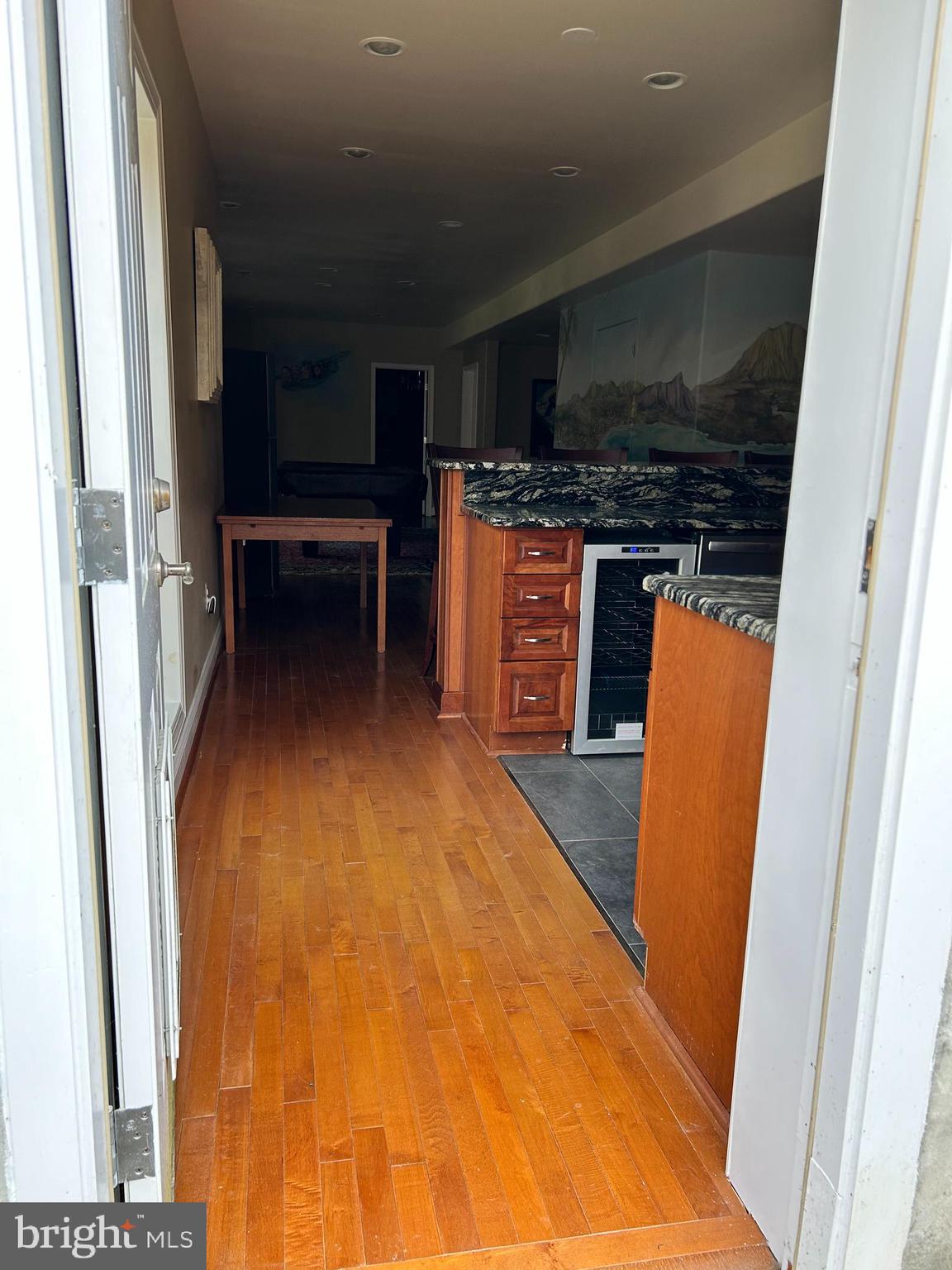 690 Good Shepherd Way Owings, MD 20736 - Photo 3 of 27 a room with wooden floor and furniture