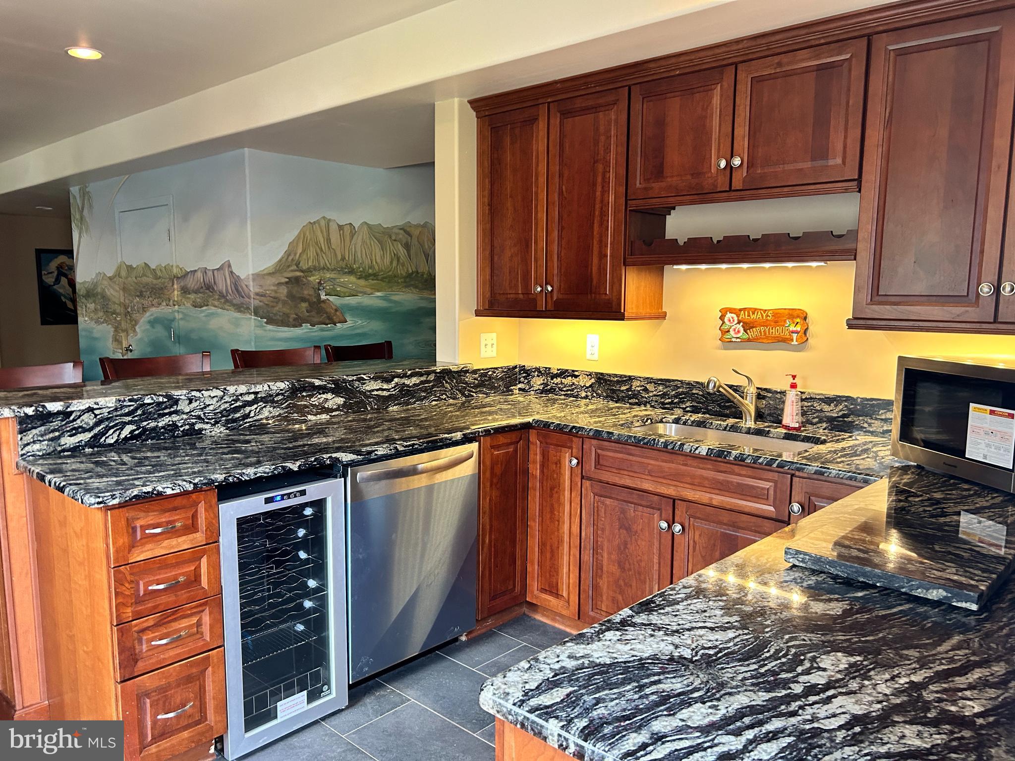 690 Good Shepherd Way Owings, MD 20736 - Photo 5 of 27 a kitchen with stainless steel appliances granite countertop a stove and a sink