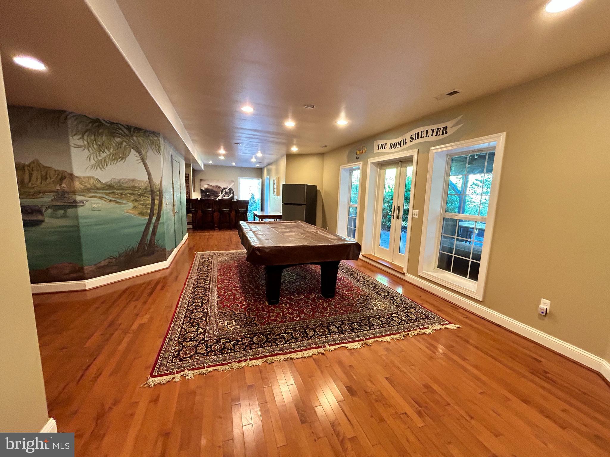 690 Good Shepherd Way Owings, MD 20736 - Photo 9 of 27 a living room with a rug