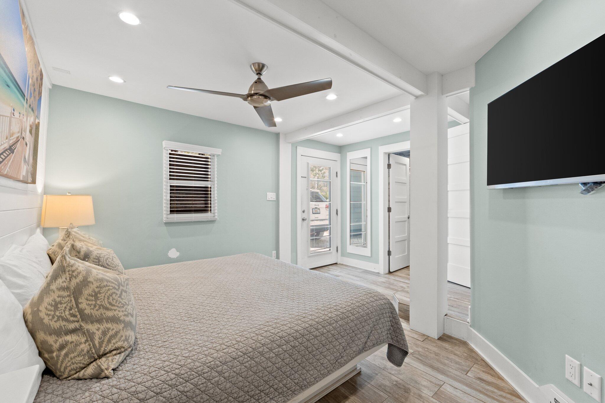 91 Cypress Hill Road Santa Rosa Beach, FL 32459 - Photo 11 of 66 a bedroom with a large bed and a window