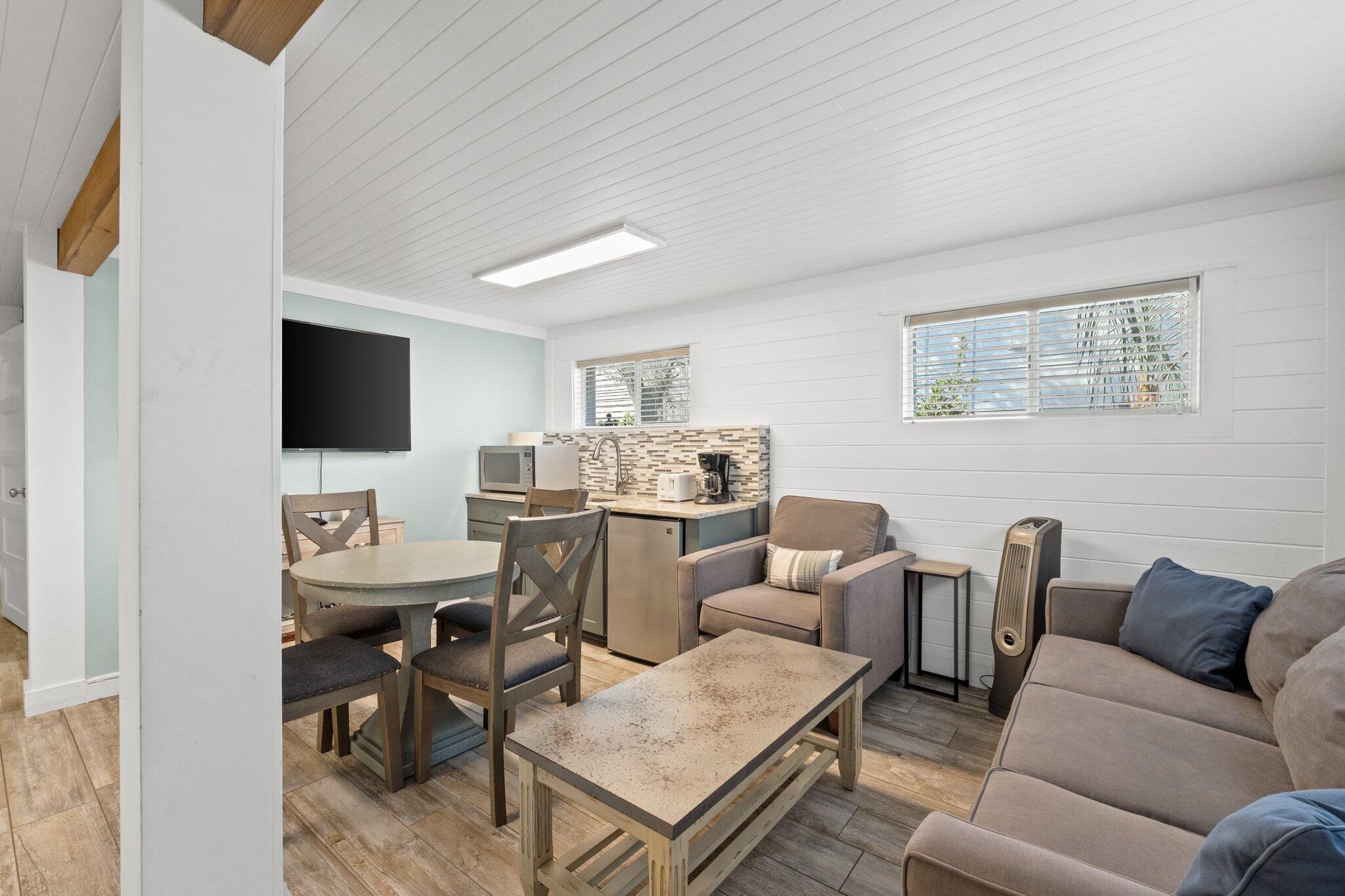 91 Cypress Hill Road Santa Rosa Beach, FL 32459 - Photo 22 of 66 a living room with furniture and a flat screen tv