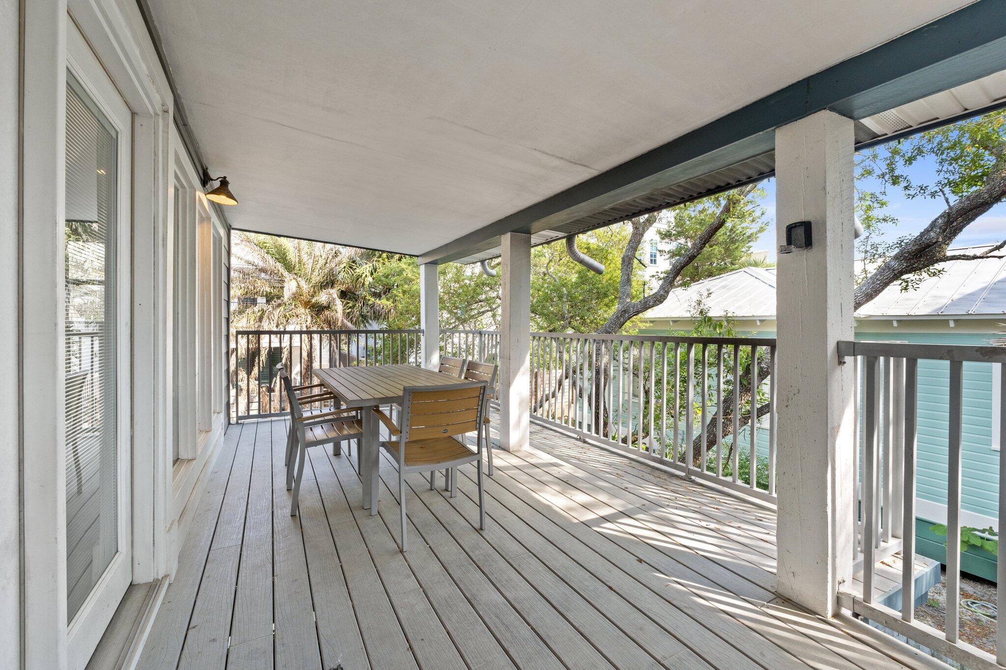 91 Cypress Hill Road Santa Rosa Beach, FL 32459 - Photo 25 of 66 a view of a room with wooden floor and outdoor space