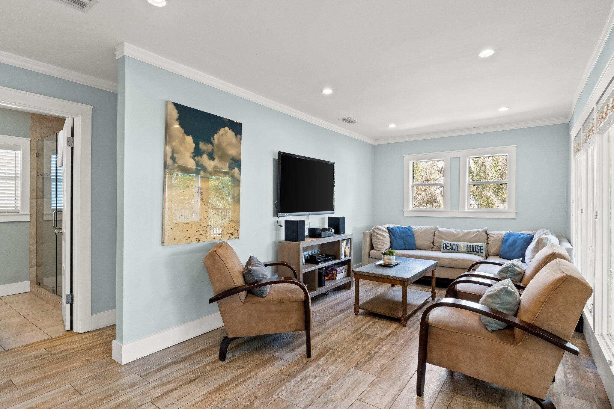 91 Cypress Hill Road Santa Rosa Beach, FL 32459 - Photo 28 of 66 a living room with furniture and a flat screen tv