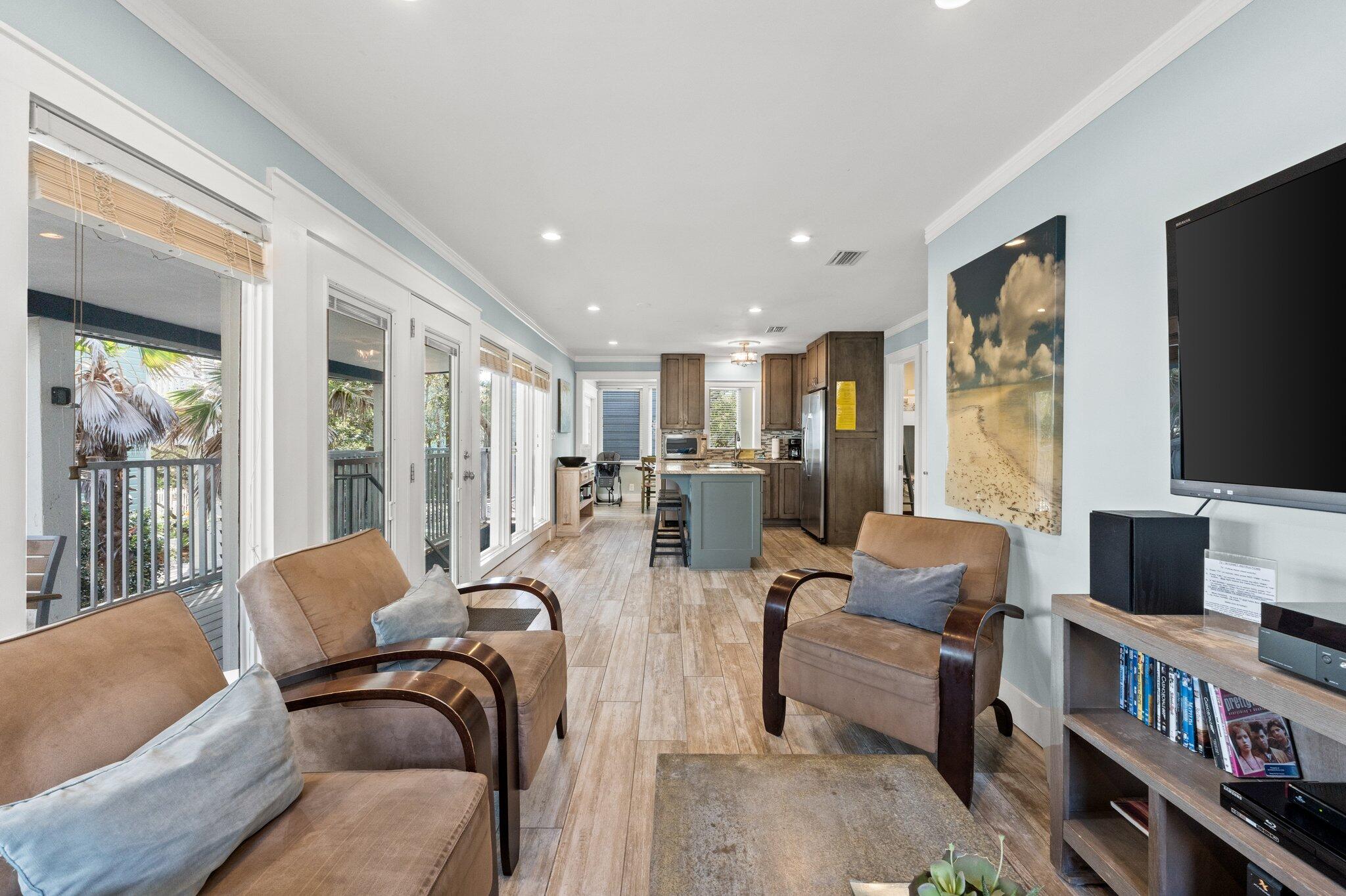 91 Cypress Hill Road Santa Rosa Beach, FL 32459 - Photo 30 of 66 a living room with furniture and a flat screen tv