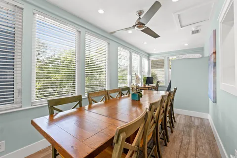 a bedroom with a large bed and a flat screen tv