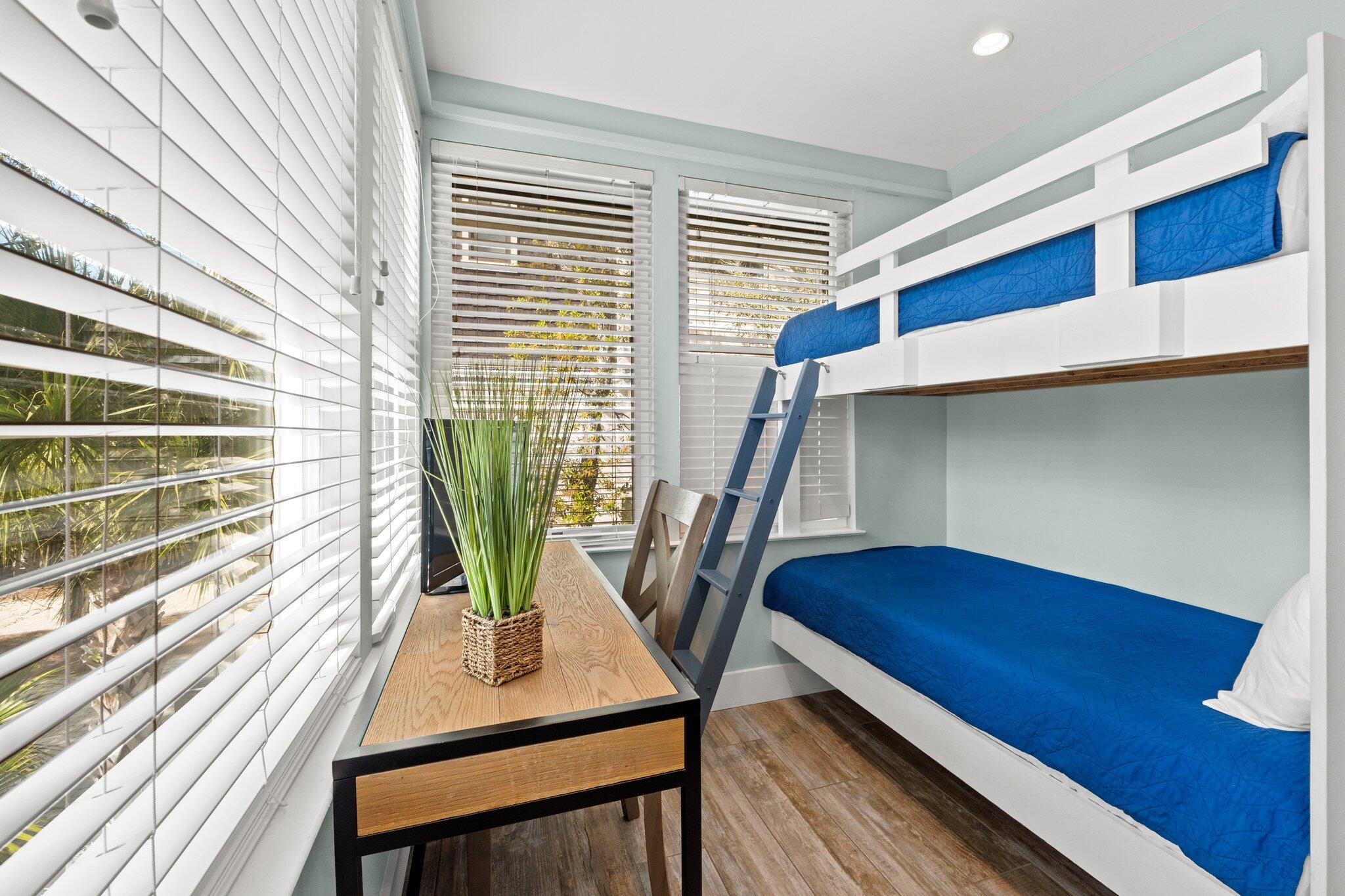 91 Cypress Hill Road Santa Rosa Beach, FL 32459 - Photo 37 of 66 a view of a room with wooden floor and chair