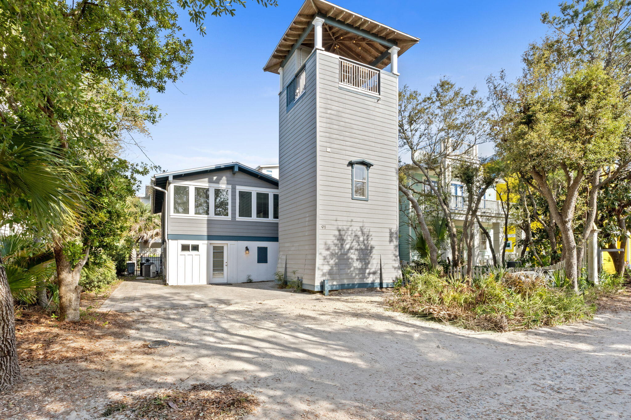 91 Cypress Hill Road Santa Rosa Beach, FL 32459 - Photo 56 of 66 a front view of a house with a yard