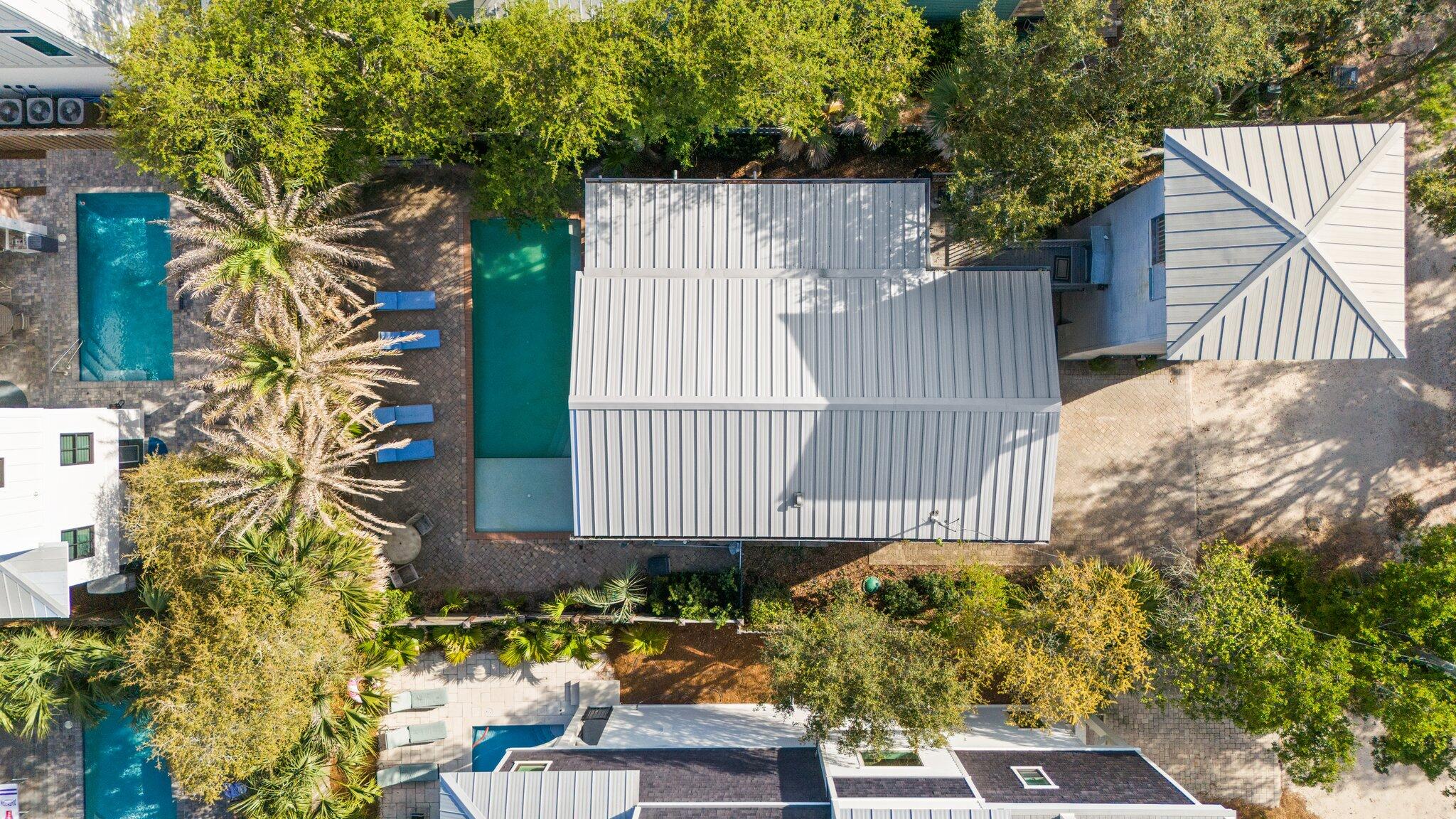 91 Cypress Hill Road Santa Rosa Beach, FL 32459 - Photo 58 of 66 a view of a house with a yard and sitting area