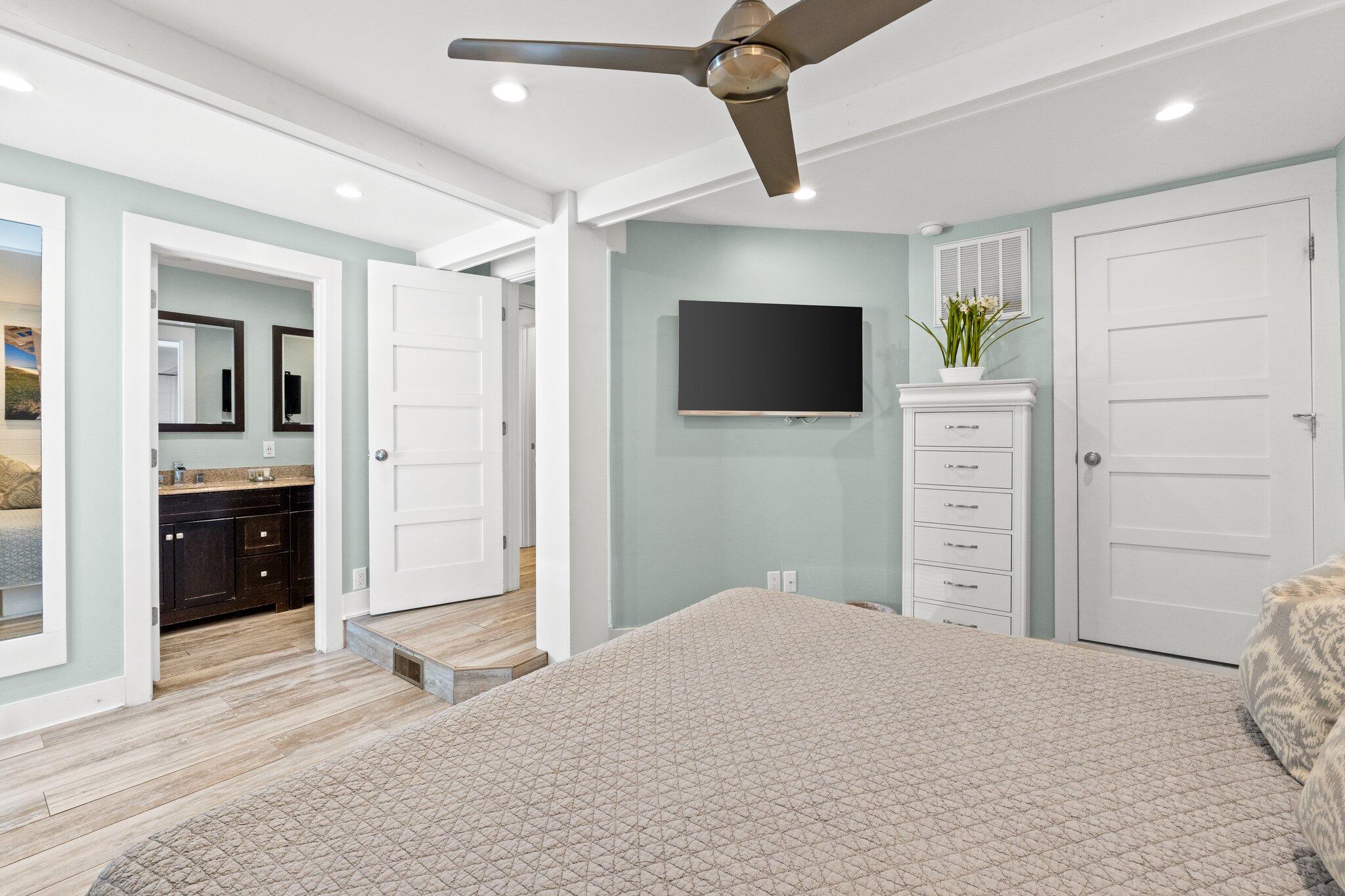 91 Cypress Hill Road Santa Rosa Beach, FL 32459 - Photo 10 of 66 a bedroom with a bed and a flat screen tv