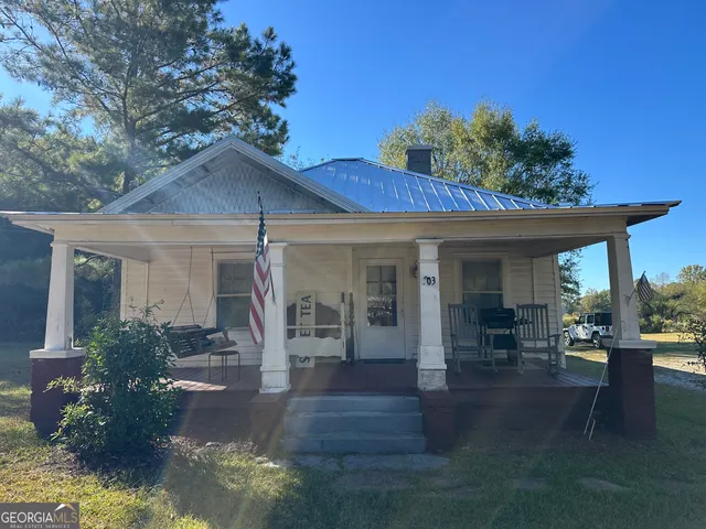 a view of a house with patio