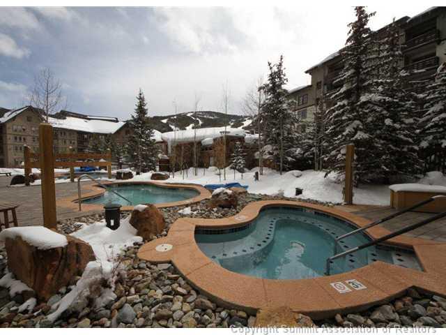 910 Copper Road, Unit 320 Copper Mountain, CO 80443 - Photo 15 of 24 a small pool with couple of relaxing chair
