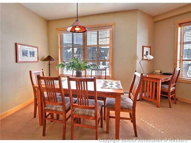 910 Copper Road, Unit 320 Copper Mountain, CO 80443 - Photo 20 of 24 a view of a dining room with furniture window and outside view