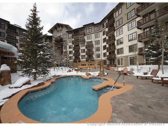 910 Copper Road, Unit 320 Copper Mountain, CO 80443 - Photo 22 of 24 a view of swimming pool with outdoor seating and yard