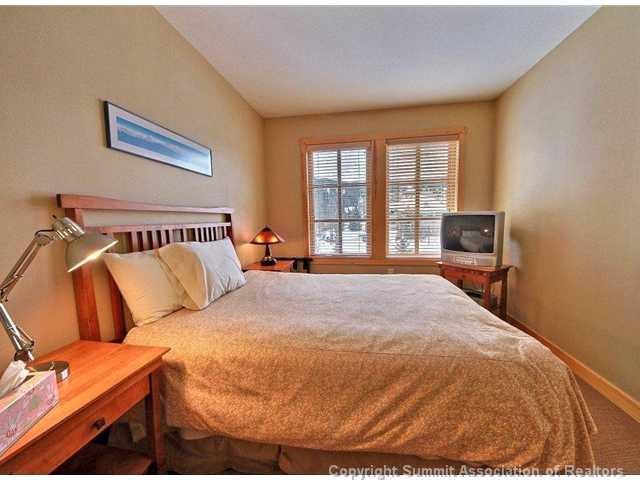 910 Copper Road, Unit 320 Copper Mountain, CO 80443 - Photo 7 of 24 a bedroom with a bed and window