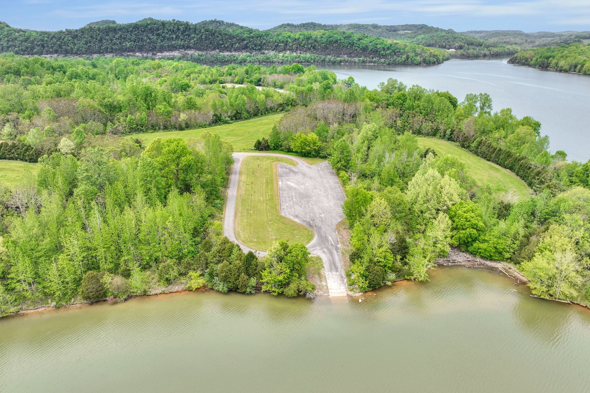 560 Sullivan Bend Road Elmwood, TN 38560 - Photo 28 of 42 a view of a lake with houses in the back