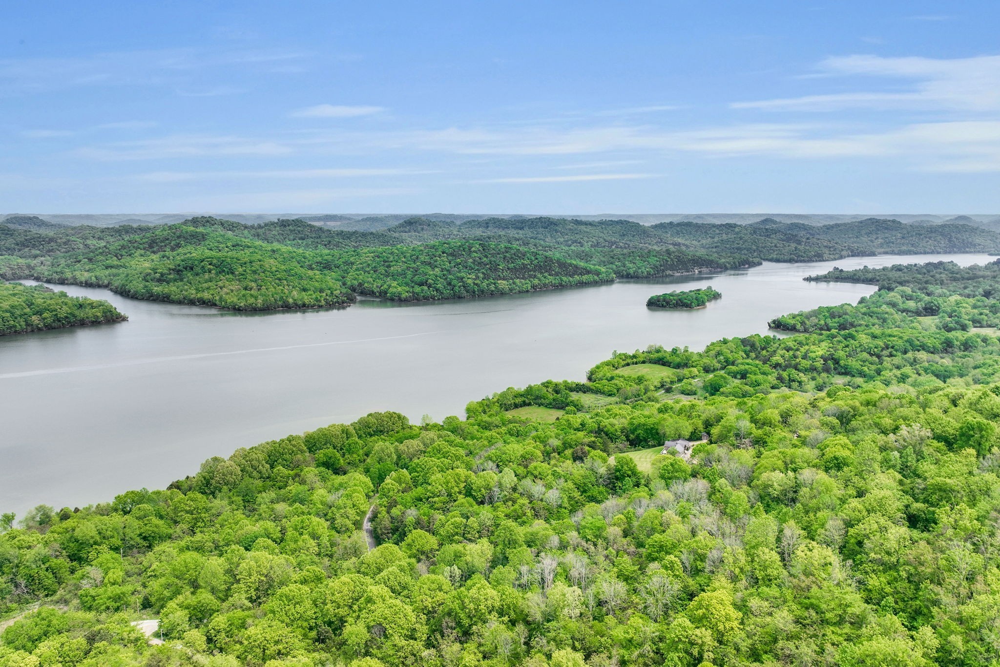 560 Sullivan Bend Road Elmwood, TN 38560 - Photo 8 of 42 a view of a lake with houses in the back