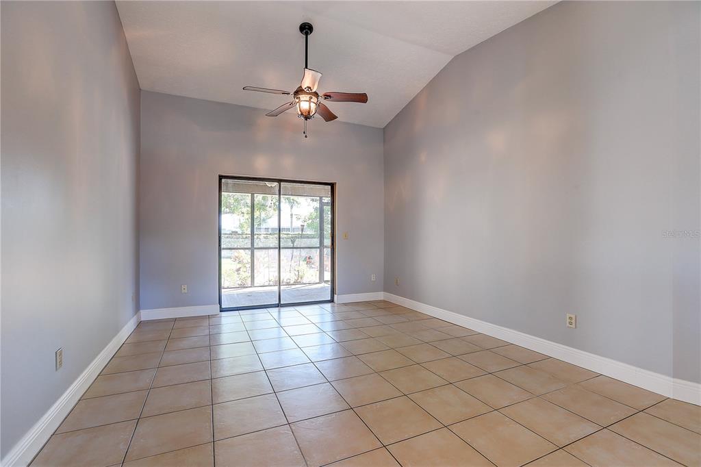 1418 Buckner Road Valrico, FL 33596 - Photo 8 of 37 a view of an empty room with a window