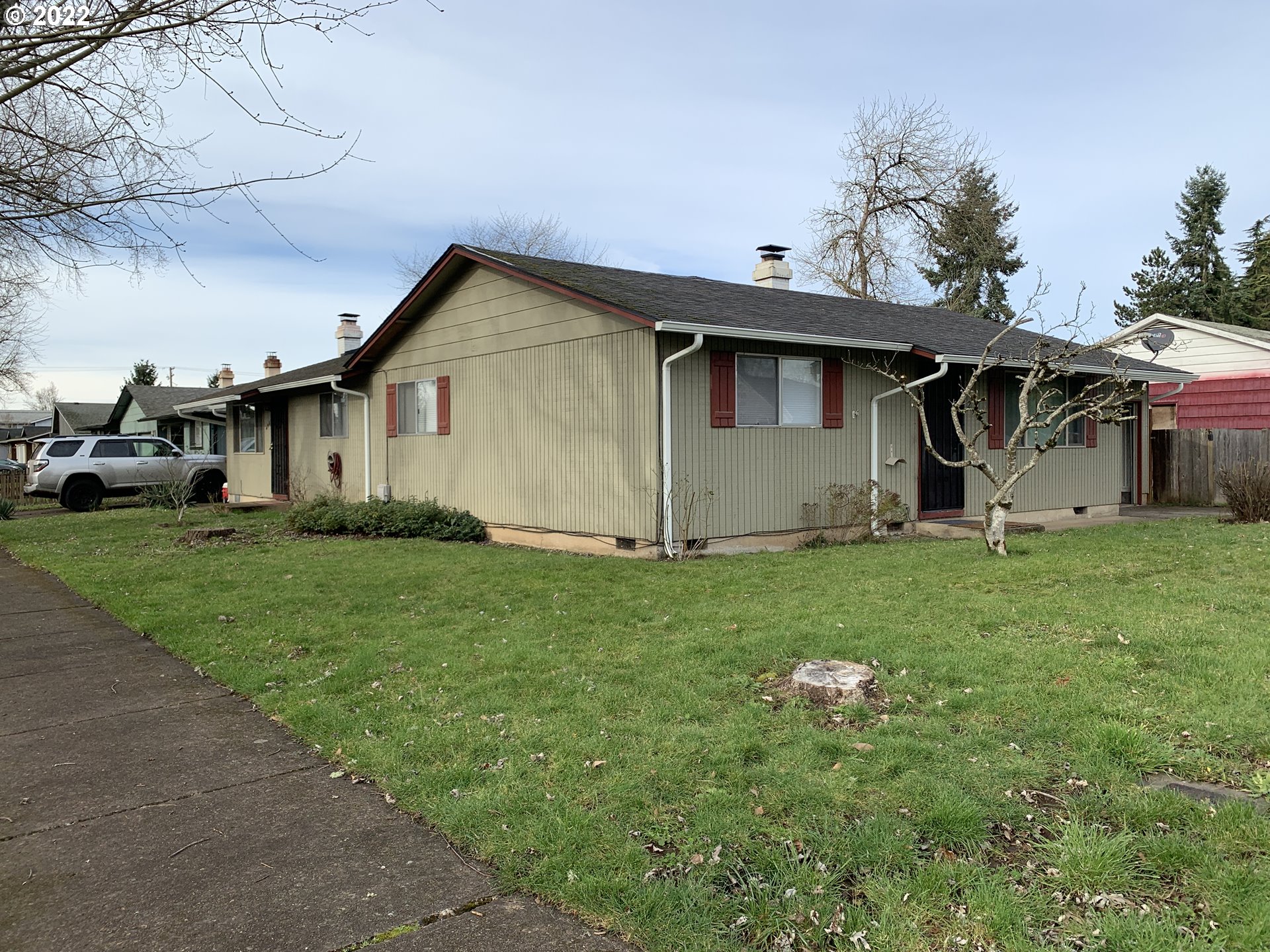 296 South 50th Place Springfield, OR 97478 - Photo 1 of 32 a house view with a garden space