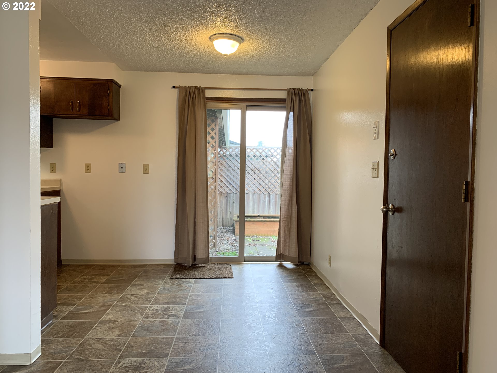 296 South 50th Place Springfield, OR 97478 - Photo 7 of 32 a view of hallway with furniture and a gate
