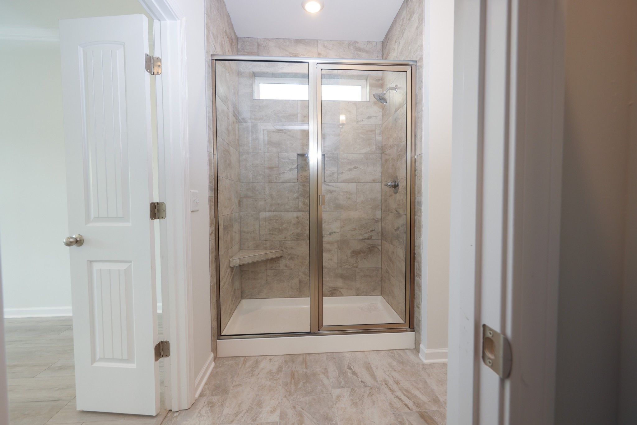 7649 Knobdate Road Smyrna, TN 37167 - Photo 14 of 23 a bathroom with a glass shower door