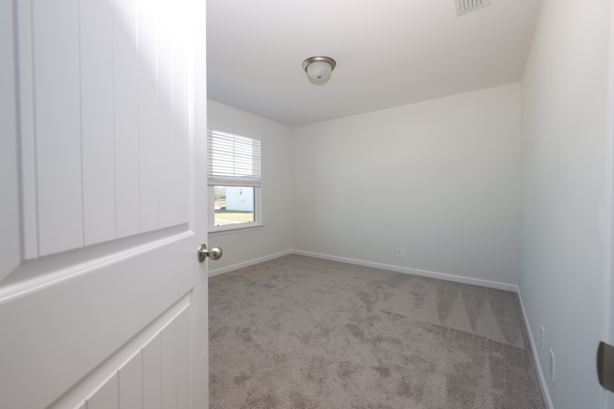 7649 Knobdate Road Smyrna, TN 37167 - Photo 22 of 23 a view of an empty room with a window