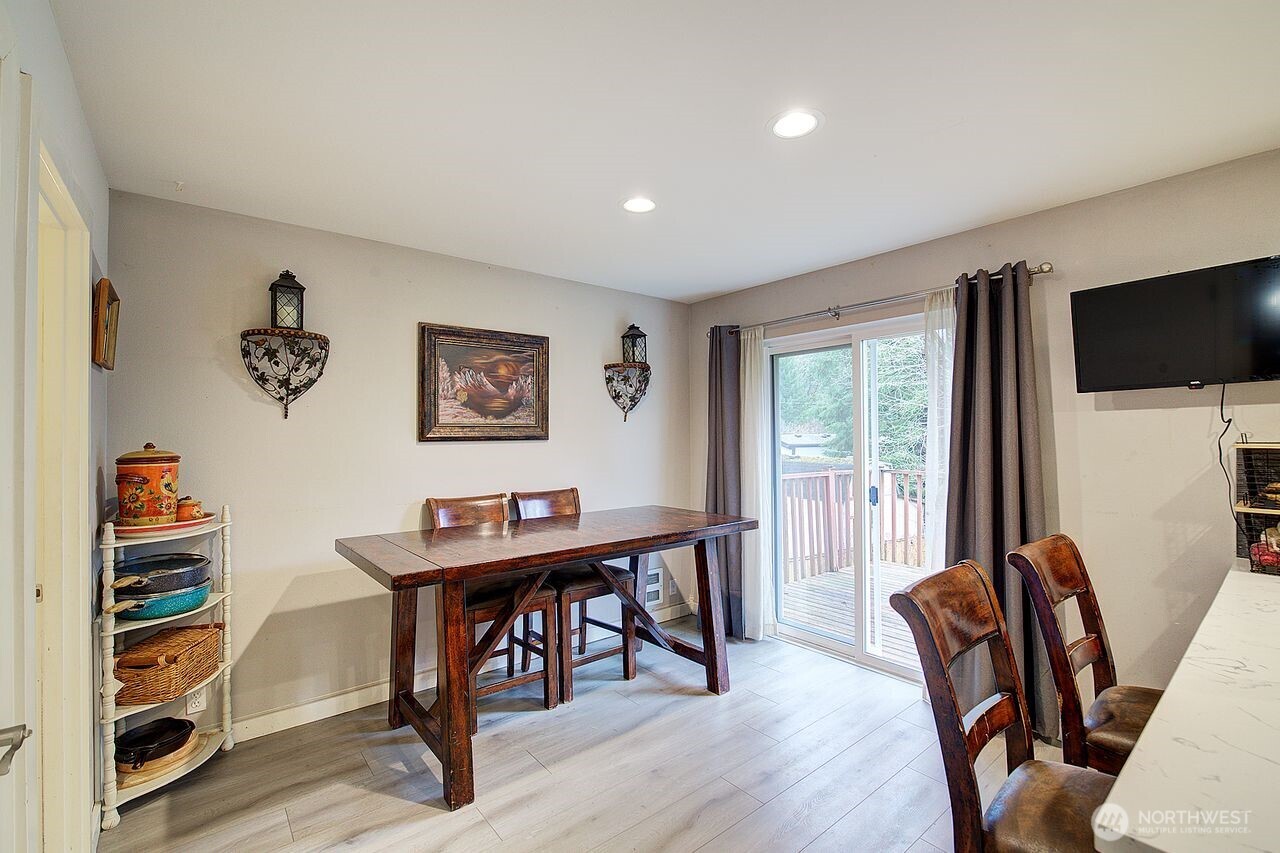 44212 Fir Road Gold Bar, WA 98251 - Photo 15 of 34 a view of a livingroom with furniture and a flat screen tv