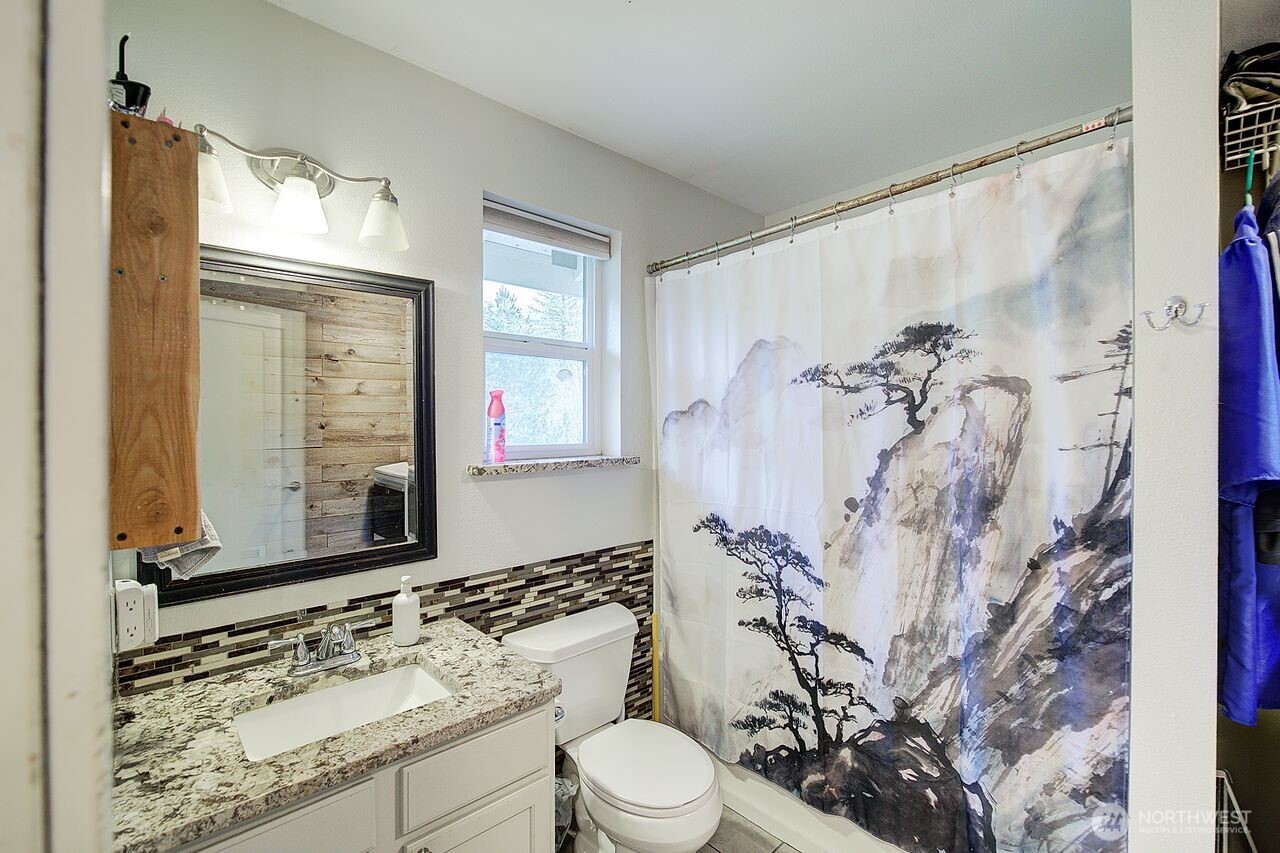 44212 Fir Road Gold Bar, WA 98251 - Photo 26 of 34 a bathroom with a sink a toilet and shower