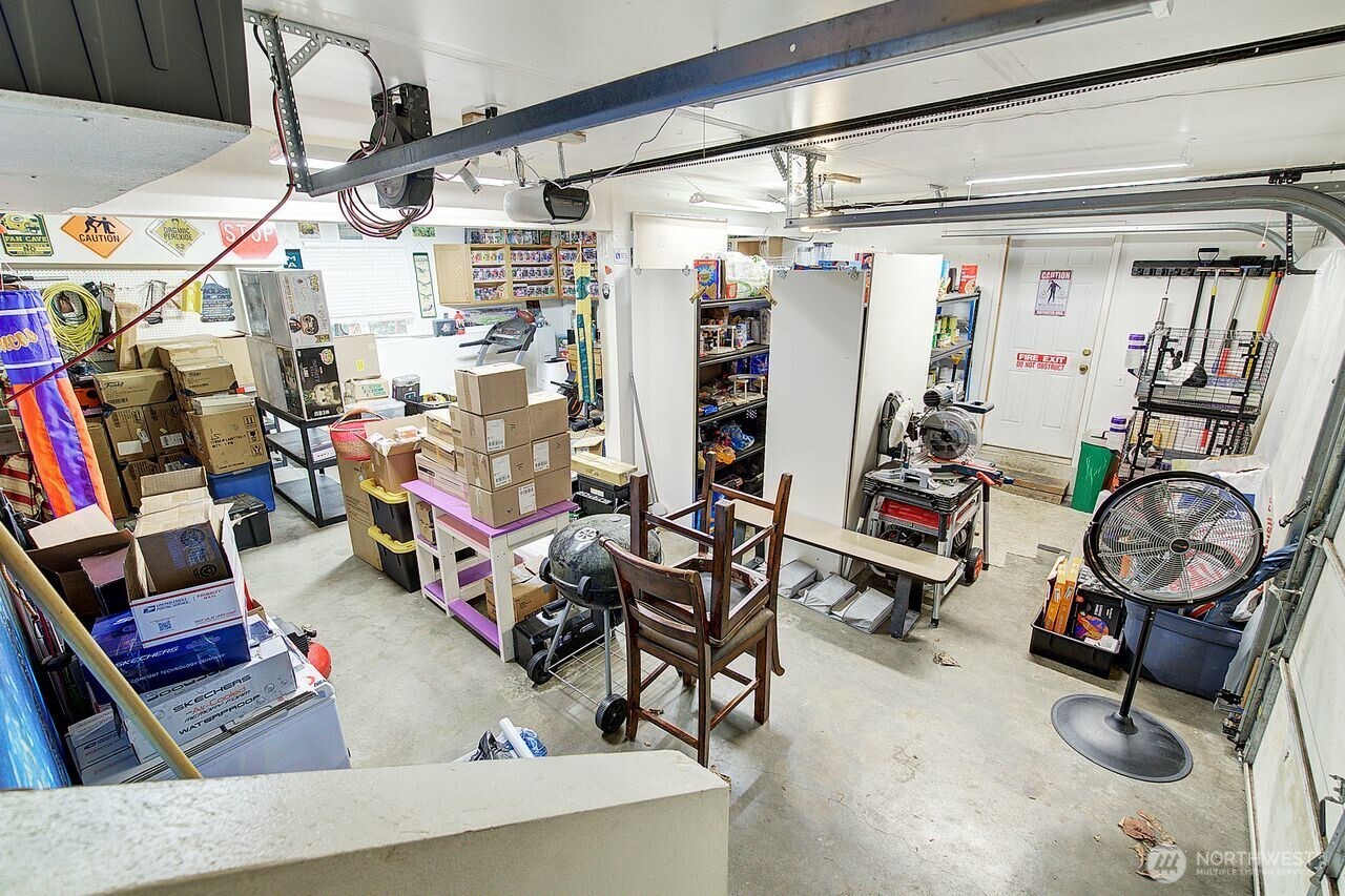 44212 Fir Road Gold Bar, WA 98251 - Photo 29 of 34 a living room with lots of furniture and a flat screen tv
