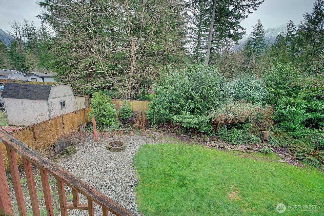 44212 Fir Road Gold Bar, WA 98251 - Photo 4 of 34 a view of a backyard from a balcony