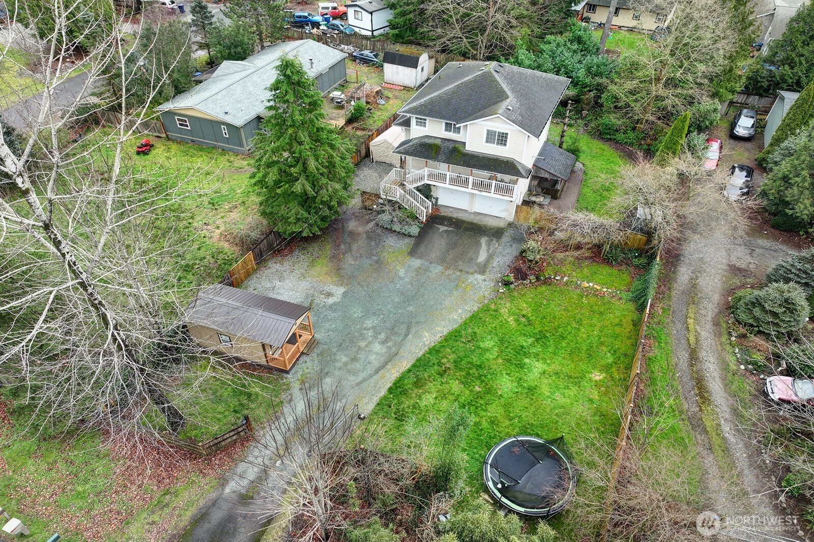 44212 Fir Road Gold Bar, WA 98251 - Photo 5 of 34 an aerial view of a house with garden space and street view
