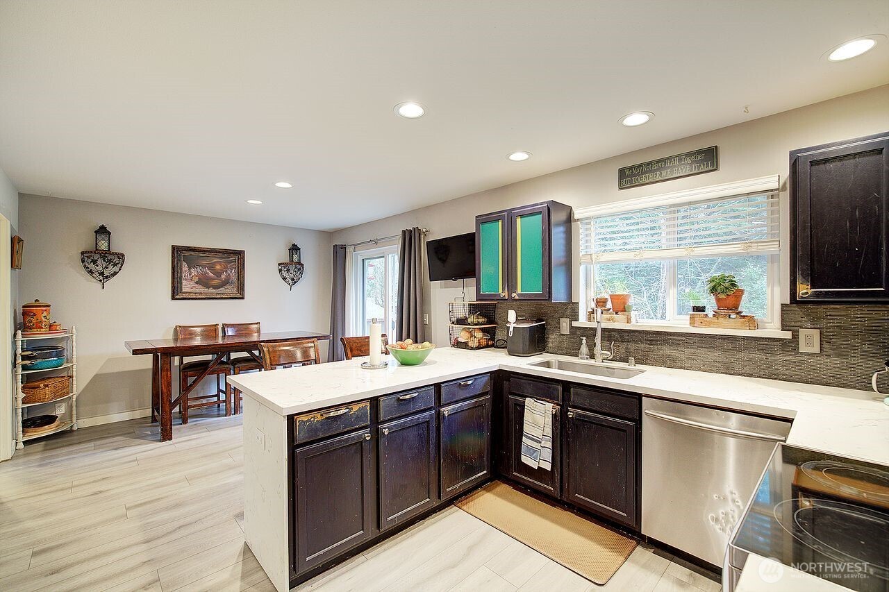 44212 Fir Road Gold Bar, WA 98251 - Photo 10 of 34 a kitchen with a sink stove and cabinets