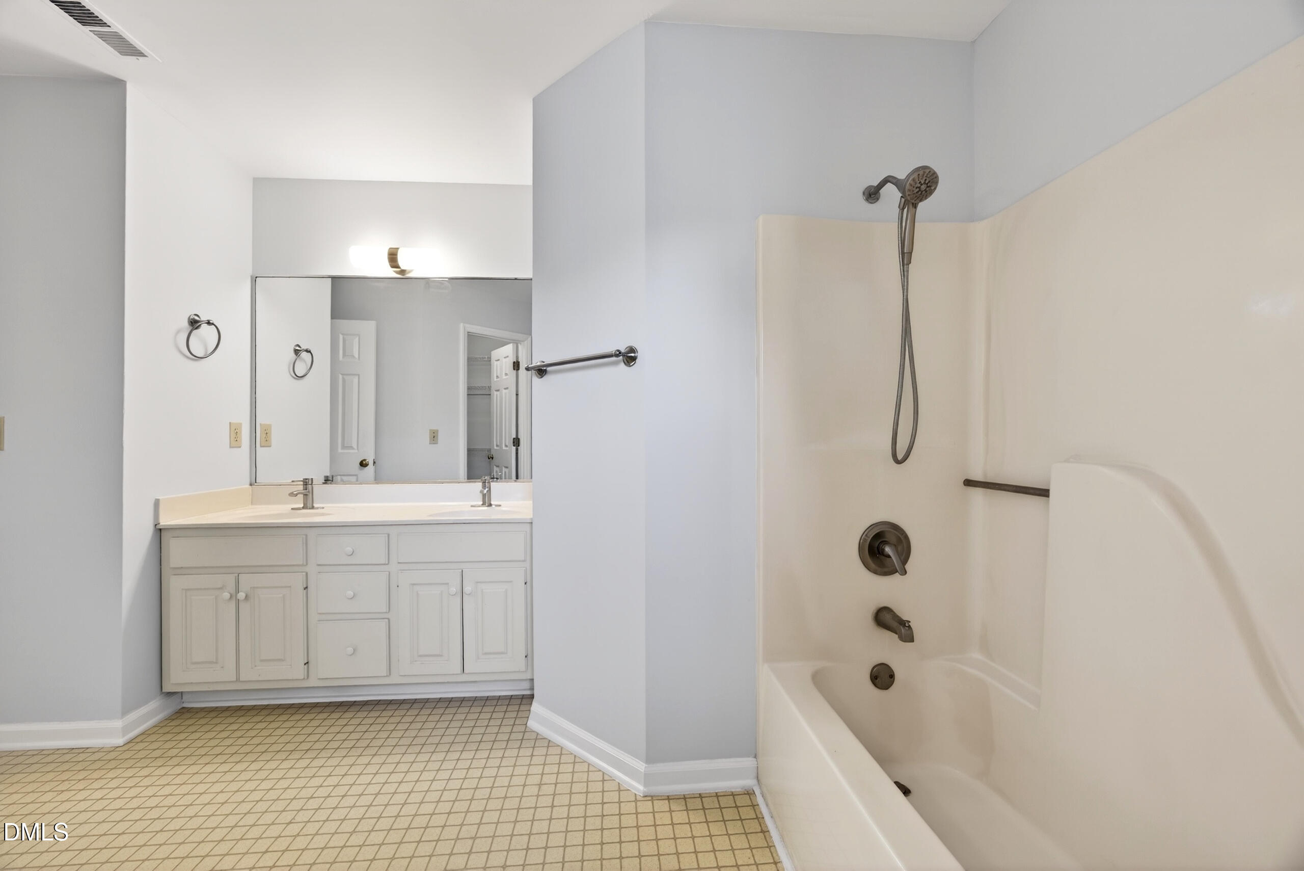 1901 Whites Mill Road High Point, NC 27265 - Photo 17 of 24 a bathroom with a tub a sink and a shower