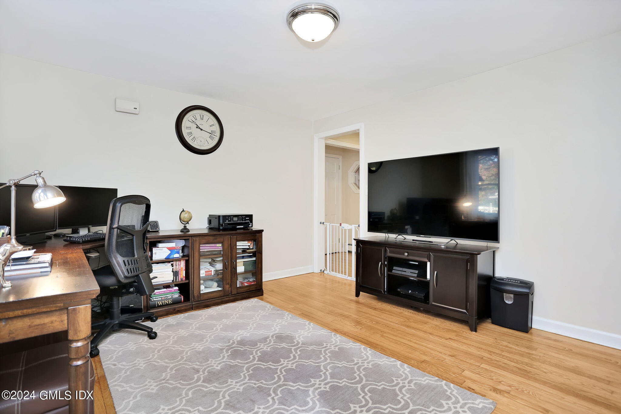44 Hendrie Avenue Riverside, CT 06878 - Photo 13 of 40 a view of a livingroom with workspace and a window
