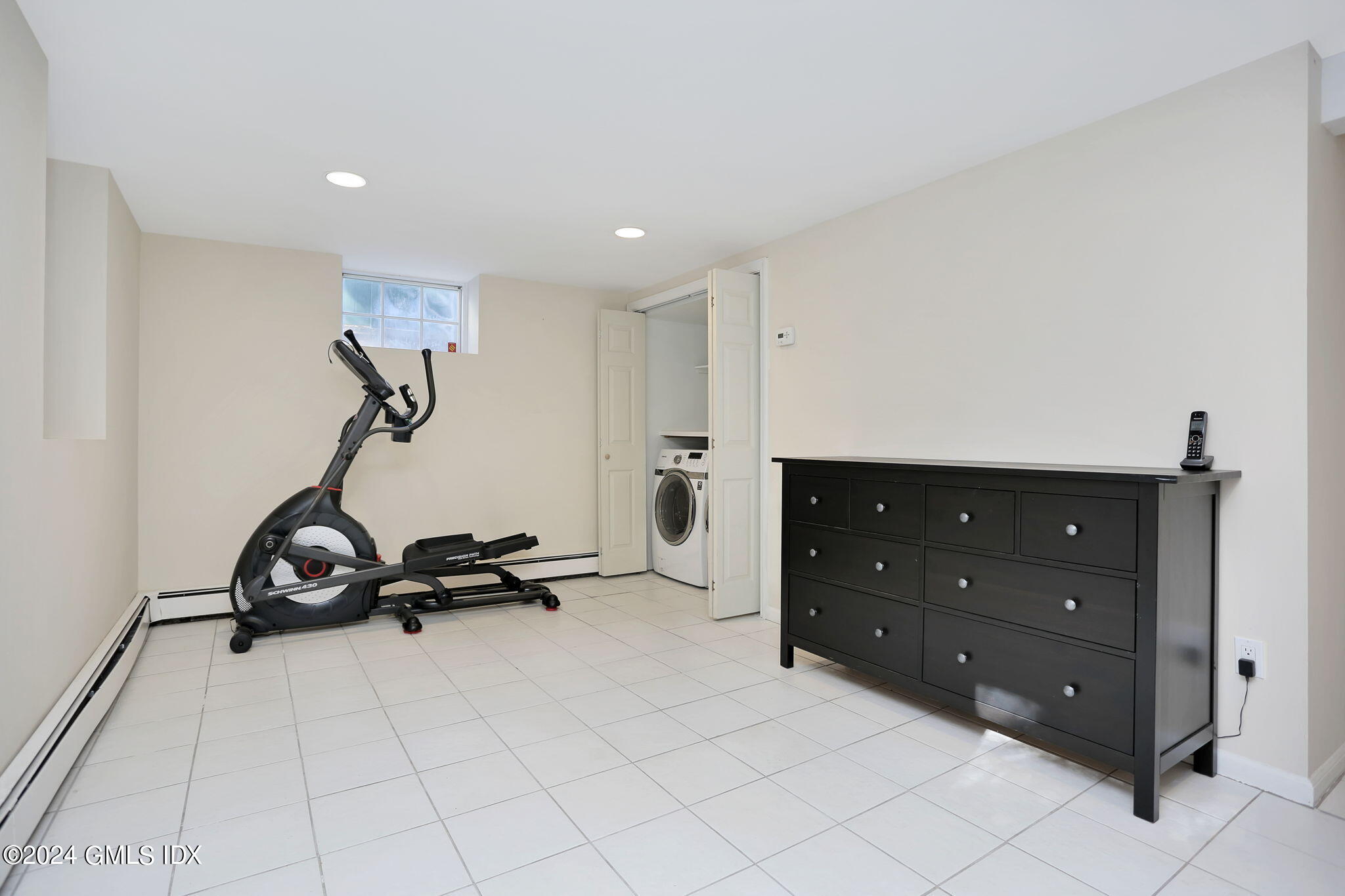 44 Hendrie Avenue Riverside, CT 06878 - Photo 21 of 40 a view of a room with gym equipment