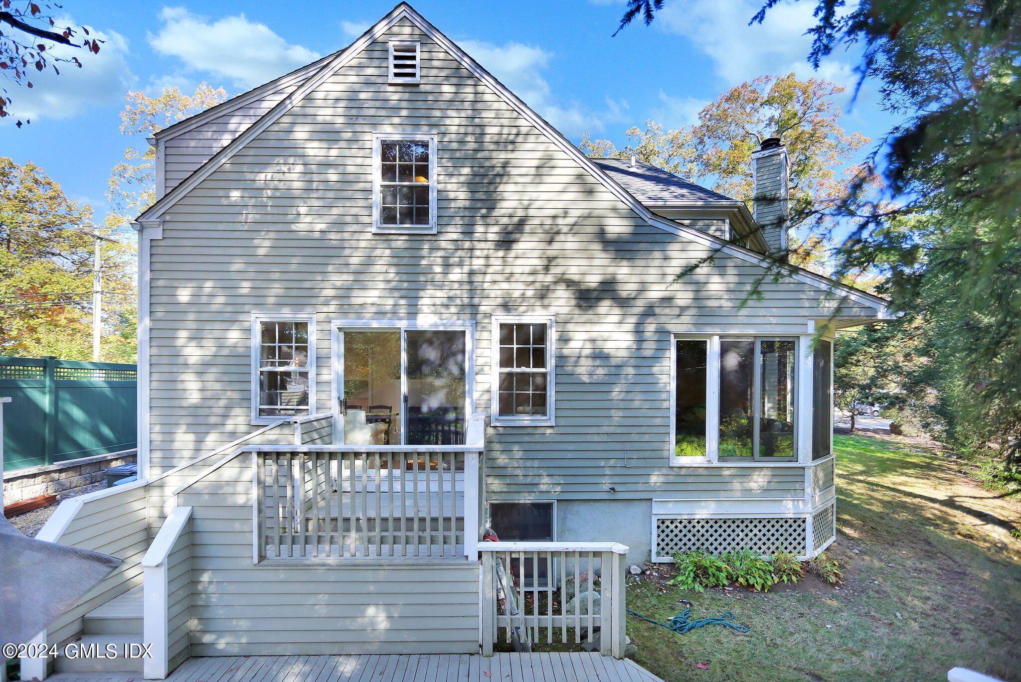 44 Hendrie Avenue Riverside, CT 06878 - Photo 29 of 40 a front view of a house with a yard