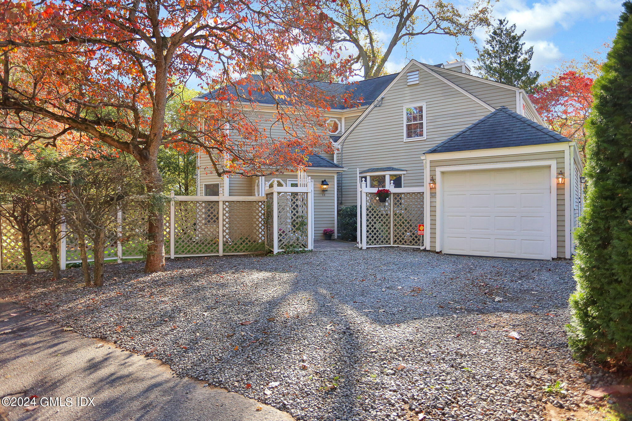 44 Hendrie Avenue Riverside, CT 06878 - Photo 32 of 40 a view of a house with a yard and garage