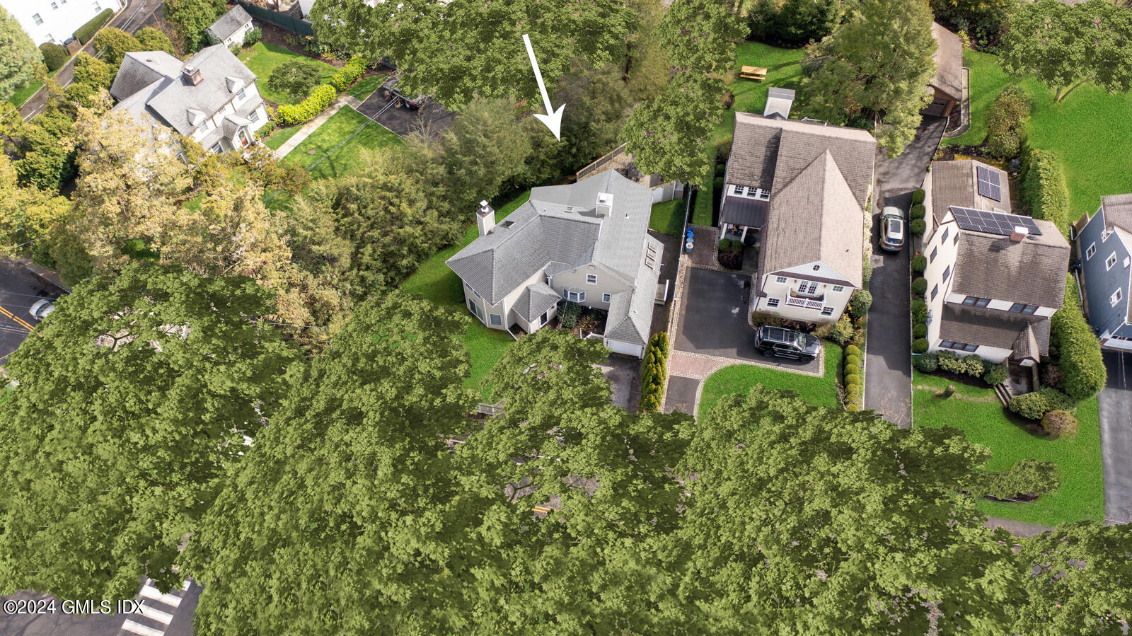 44 Hendrie Avenue Riverside, CT 06878 - Photo 34 of 40 an aerial view of a house with yard and outdoor seating