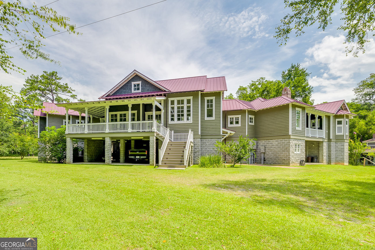 165 Shearouse Landing Brooklet, GA 30415 - Photo 1 of 78 a view of a house with a swimming pool