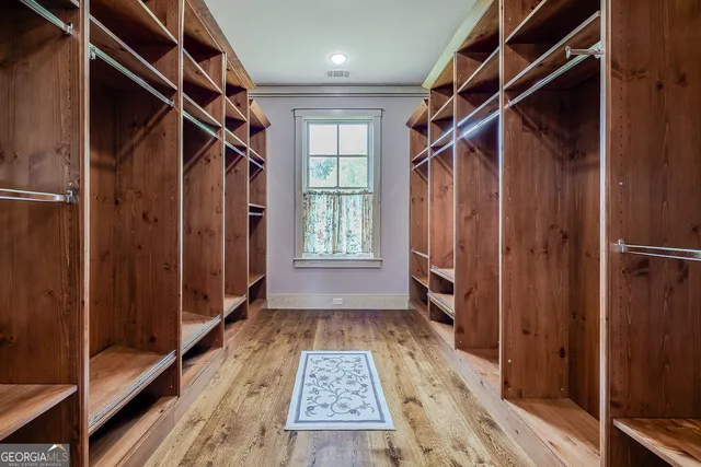 a view of a workspace with furniture and a dresser