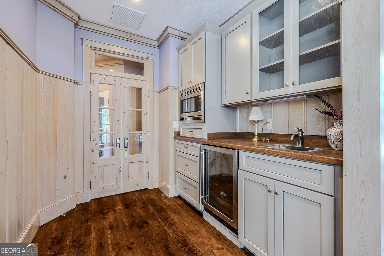 165 Shearouse Landing Brooklet, GA 30415 - Photo 39 of 78 a kitchen with stainless steel appliances granite countertop a refrigerator and a stove top oven