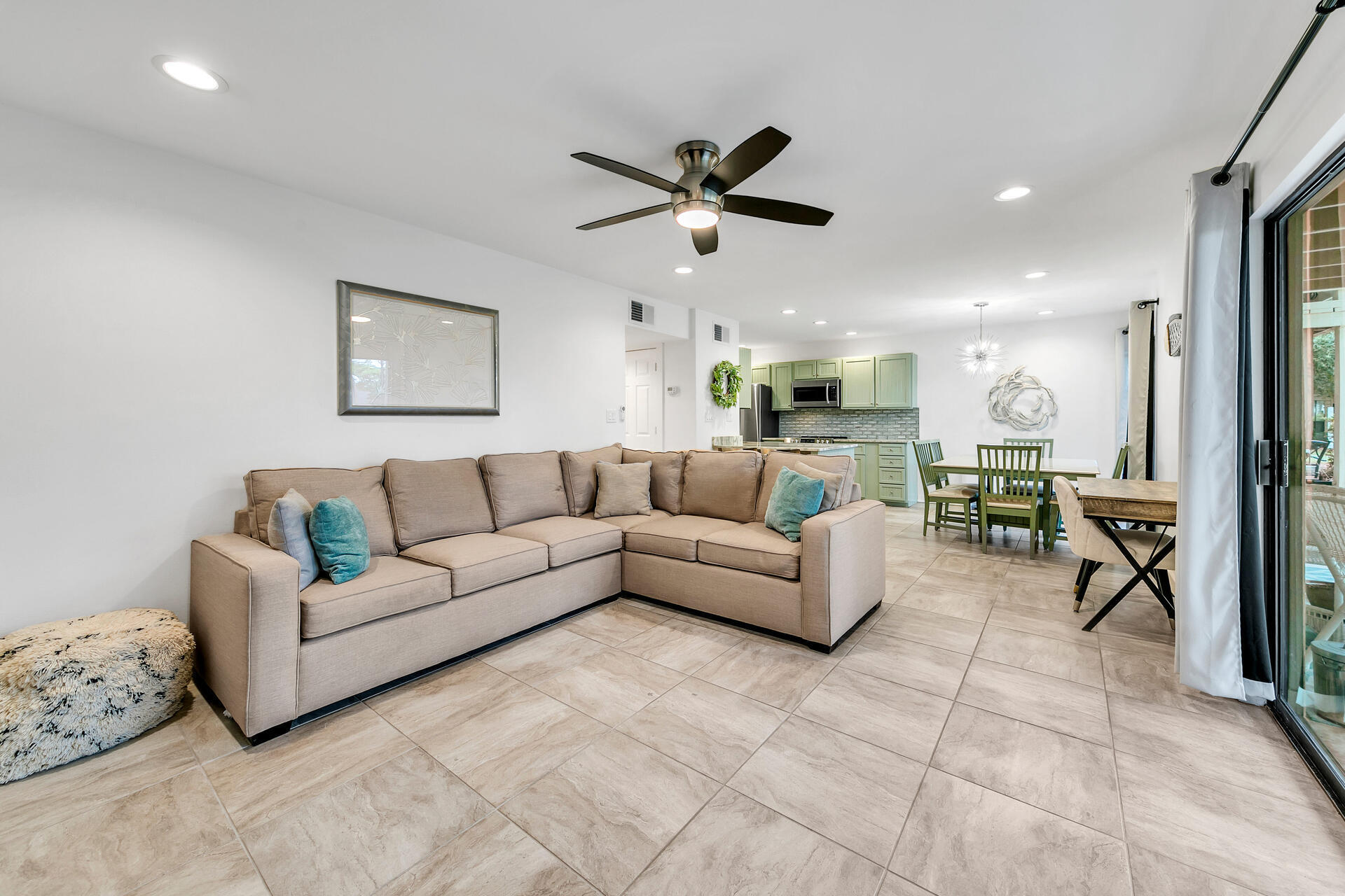 277 Sunset Bay, Unit 27A Miramar Beach, FL 32550 - Photo 16 of 42 a living room with furniture and a view of kitchen