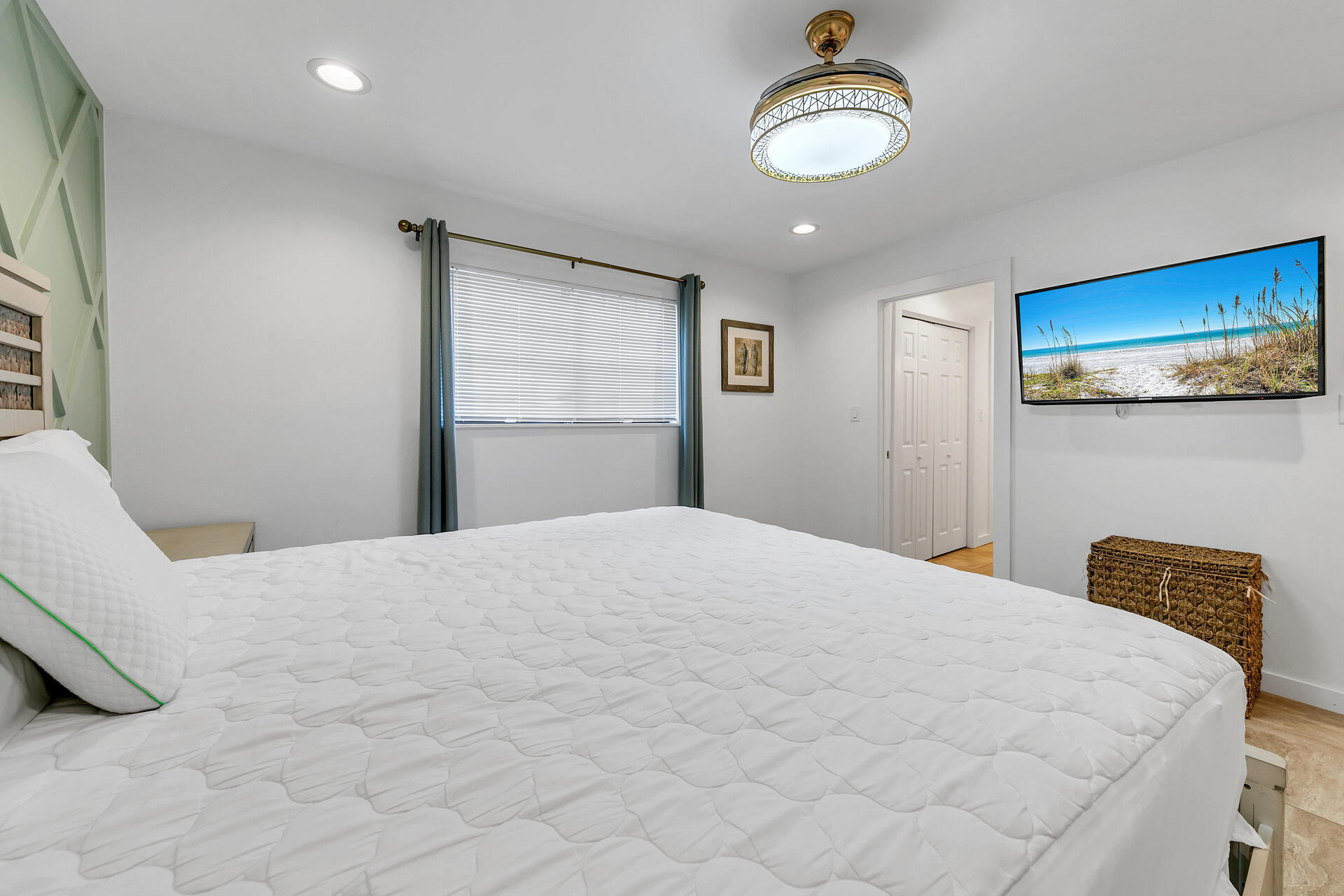 277 Sunset Bay, Unit 27A Miramar Beach, FL 32550 - Photo 19 of 42 a bedroom with a bed and a lamp