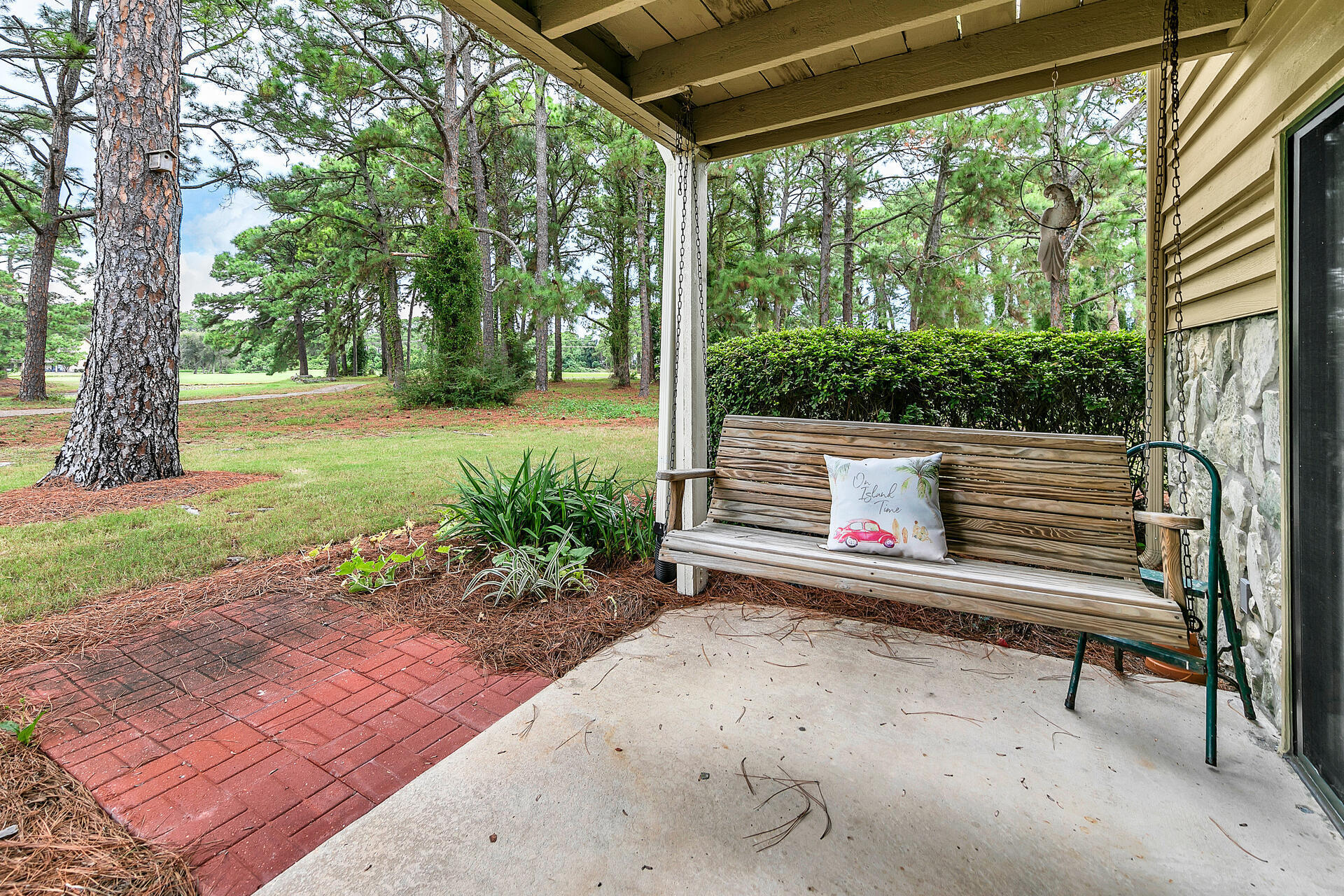 277 Sunset Bay, Unit 27A Miramar Beach, FL 32550 - Photo 35 of 42 a view of a bench in the garden