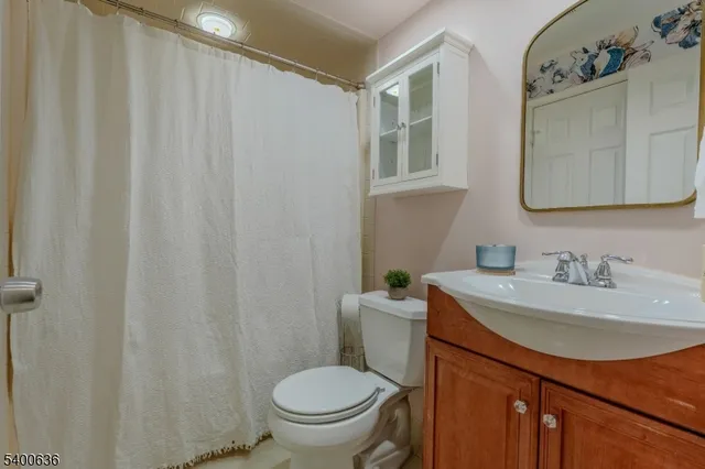 a city street lined with buildings and trees