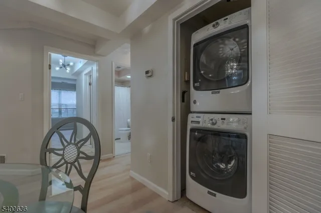 a close view of a utility room with washer and dryer