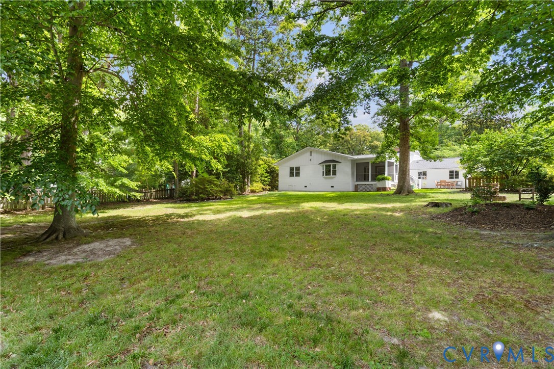 3136 Old Quarry Road Richmond, VA 23225 - Photo 25 of 39 Expansive green lawn with mature trees and a white