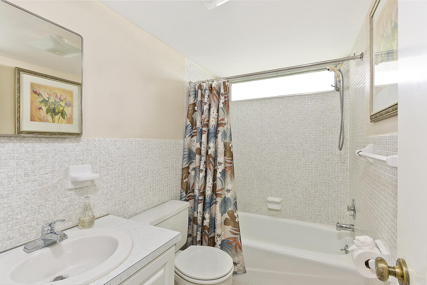 20 Southeast 13th Street, Unit C1 Boca Raton, FL 33432 - Photo 13 of 19 a bathroom with a sink a toilet and shower